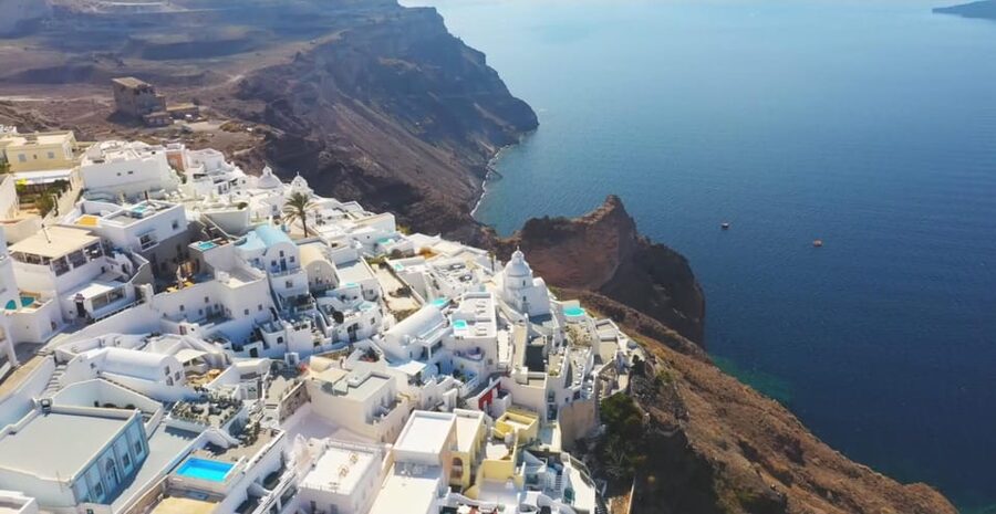 Santorini Tour with Pick-up from Heraklion - Perissa Beach for Black Sand and a Breather