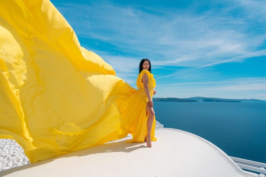 Santorini: Unique Flying Dress Photoshoot Experience - Dress choice is part of the strategy, not just the outfit