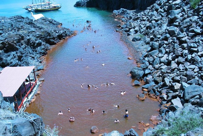 Santorini Volcanic Islands Cruise: Volcano, Hot Springs and Thirassia - Nea Kameni lava islet and Palea Kameni thermal waters