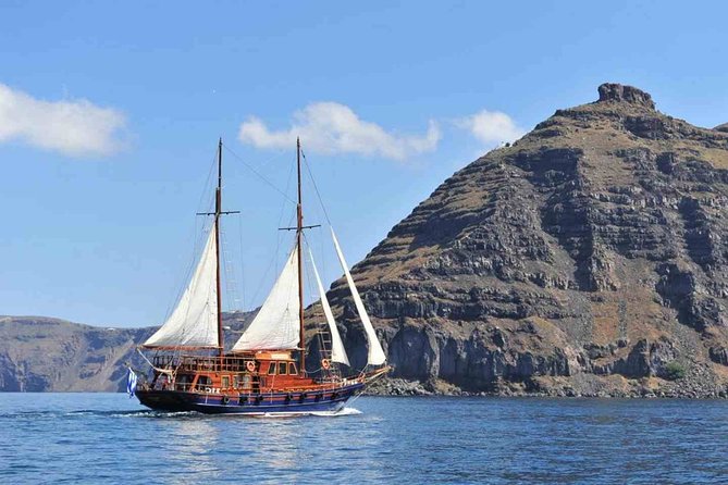 Santorini Volcanic Sunset Cruise - On board: what the caique setup means for comfort and photos