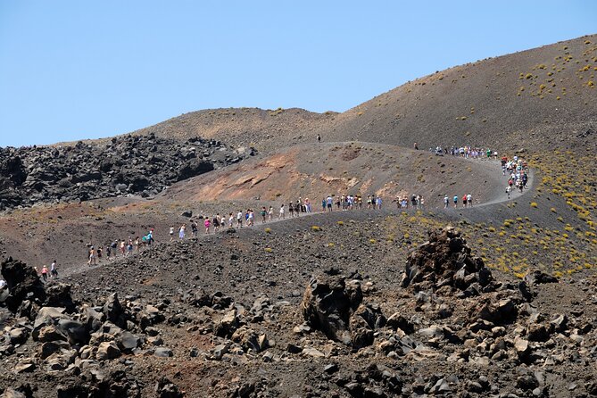 Santorini Volcano Cruise Including Hot Springs and Thirasia - Palea Kameni Hot Springs: Warm Water, Sulfur, and Mud Time