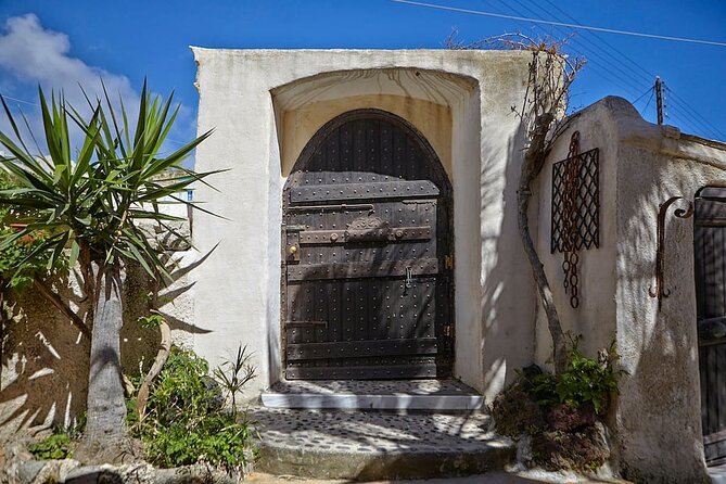 Santorini wine tasting and Traditional Cave Settlement Tour - Hidden Spots Without the Stress of Self-Driving