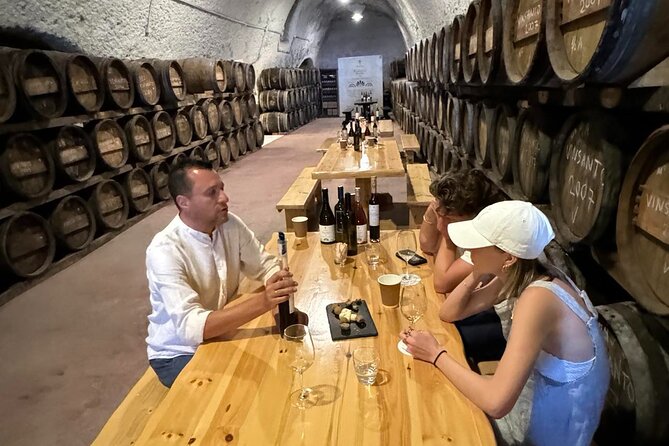 Santorini Wine Tour: 2 Wineries with Tastings & Local Snacks - Stop 2 at Venetsanos Winery: Portside Caldera Views