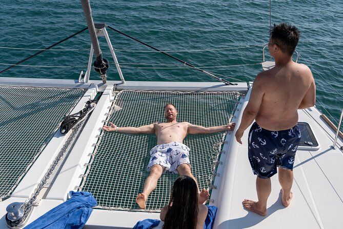 Semi Private Santorini Catamaran Tour - Red Beach: same coast, totally different mood
