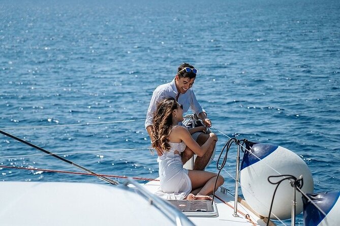 Semi Private Santorini Catamaran Tour - Nea Kameni: volcanic swimming and snorkeling that is set up for fun