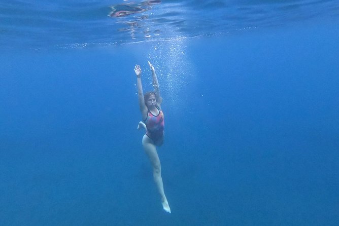 Serenity Kayak : Sea Caves Kayak Trip with Snorkeling & Picnic - White Beach cliff jumping, a thrill stop with choice built in