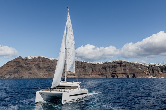Shared Catamaran Half Day Cruise in Santorini - Nea Kameni and Palea Kameni hot springs: how the swimming works