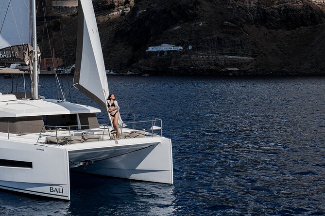 Shared Catamaran Half Day Cruise in Santorini - White Beach and Mesa Pigadia: two shoreline moods, tight stop times