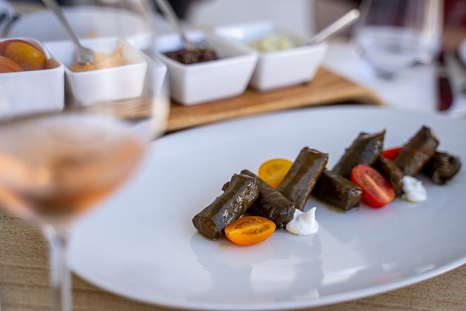 Small-Group Greek Food and Wine Tasting Tour in Santorini - Stop 2: A traditional meze dinner with local wine