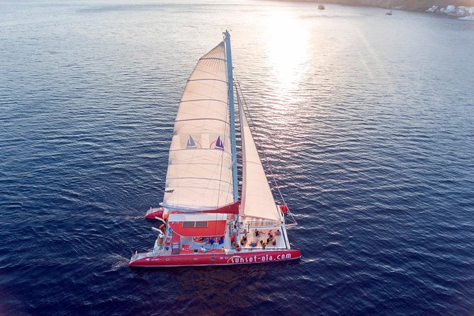 Sunset Sailing Catamaran Cruise in Santorini with BBQ and Drinks - White Beach snorkeling plus onboard BBQ time