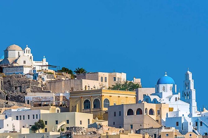 The Highlights of Santorini on a Mini Bus Daily Sunset Tour - Oia at the end, blue domes, narrow lanes, and how to work the sunset timing