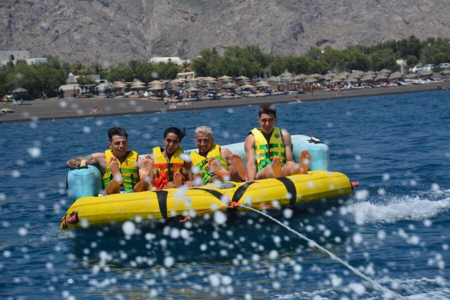 Thrill Waves Tubing at Perivolos Beach, Santorini - Sea-Soaked Fun at Perivolos Beach