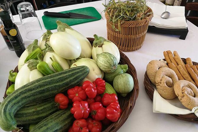 Traditional Kouzina Santorini Cooking Experience - Chef Alexandra and partner Eleanor: what kind of instruction to expect