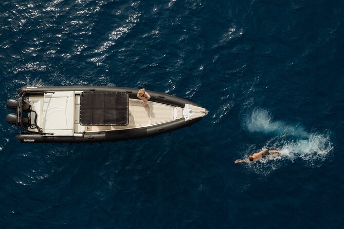 Unique Half-Day Private Motor Boat Cruise in Santorini - The caldera between Efta Pedes and the old port, plus a swim moment