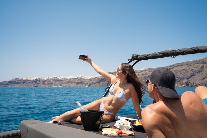 Unique Half-Day Private Motor Boat Cruise in Santorini - Palea and Nea Kameni volcano islands, black sand, and hot springs